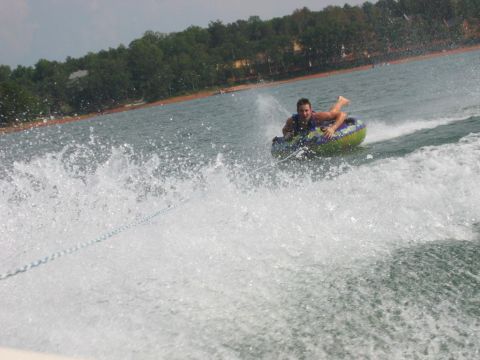 1985 Ford LTD Crown Victoria - A person enjoys tubing on a sunny day at Lake Hartwell, SC.