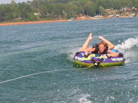 1985 Ford LTD Crown Victoria - A person enjoys tubing on a sunny day at Lake Hartwell, SC.