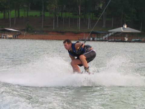 1985 Ford LTD Crown Victoria - A person enjoys wakeboarding on a sunny day at Lake Hartwell, SC.