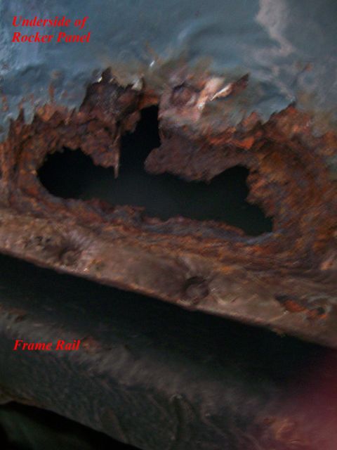 1995 Mercury Grand Marquis - Severe rust damage on the rocker panel and frame rail of a vehicle.