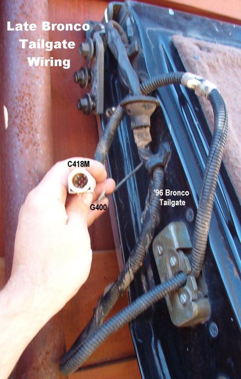 1983 Ford Bronco - Note that there is no connector near the ground wire, which is forward of the L taillight. C418 is located inboard of the L frame rail betw…