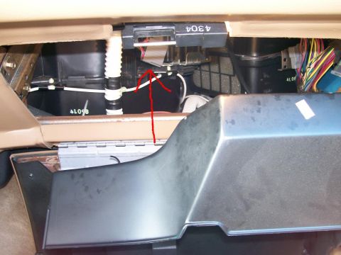 1995 Mercury Grand Marquis - Close-up view of the vehicle's interior components, including electrical wiring and ventilation system parts.