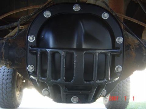 1994 Ford Bronco - Close-up view of a vehicle's rear differential cover, showing a black aftermarket protective cage.
