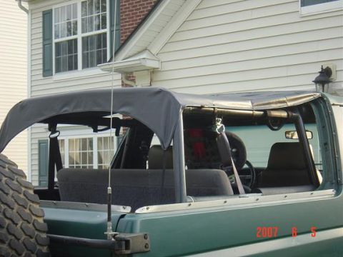 1994 Ford Bronco - Luckily the bikini top fit the dimensions of my rollcage fairly well after adding 10" to it.