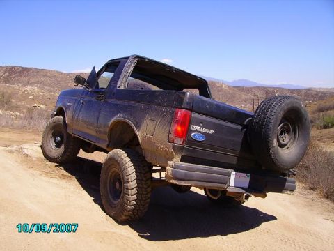 1990 Ford Bronco - This 1990 Ford Bronco is shown off-road on a sunny day.