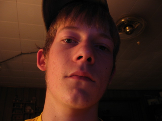 Close-up of a person's face with a Supermotors logo in the corner