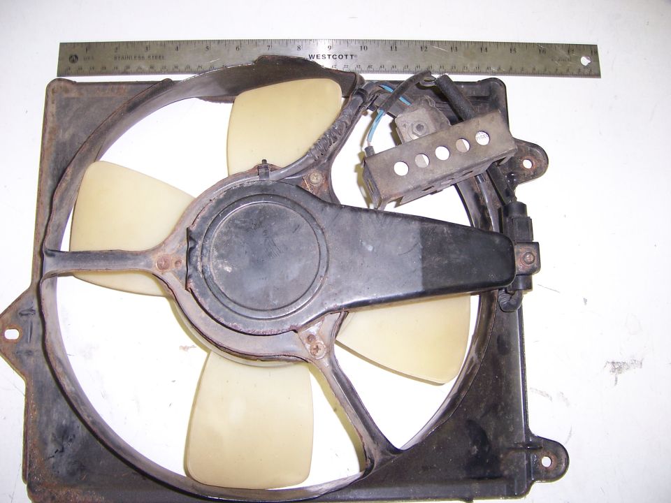 Radiator fan assembly with a Westcott ruler above it