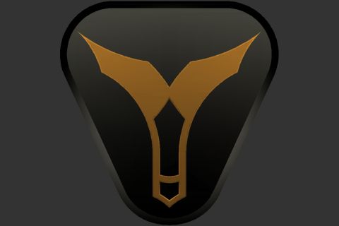 1996 Ford Bronco - A black triangular emblem with a gold stylized bull or bull horns design is shown.