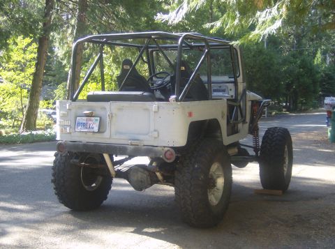 1986 Ford Bronco - This modified Toyota Land Cruiser FJ40 features a custom roll cage and off-road suspension system.