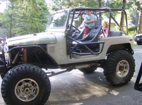 1986 Ford Bronco - This heavily modified Toyota Land Cruiser FJ40 has a roll cage and oversized tires.