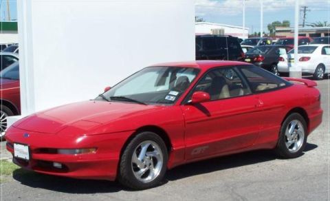 1996 Ford Probe - Red 1996 Ford Probe GT with a spoiler and GT badging on the side.