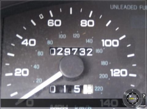 1996 Ford Probe - Close-up of a car's dashboard, displaying the speedometer and odometer readings.