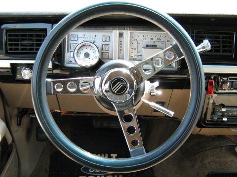 1988 Mercury Grand Marquis - Interior view of a 1988 Mercury Grand Marquis, an aftermarket steering wheel and dashboard.
