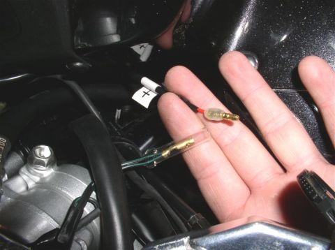 1990 Ford Bronco - Close-up of electrical connectors and wiring, with a watermark for SuperMotors.net.