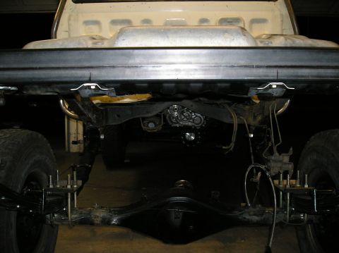 1986 Toyota Hilux - Underside view of a truck's rear axle and suspension components.
