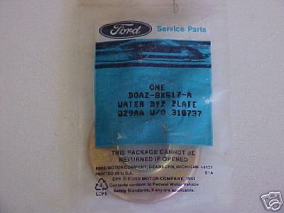 1972 Ford Ranchero - This is a Ford water bypass plate, part number DOAZ-BK517-A, shown in its original service parts packaging.