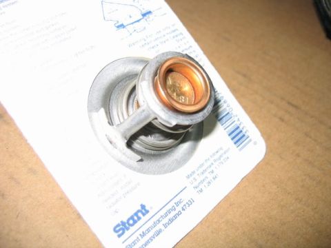 1972 Ford Ranchero - A Stant engine thermostat is shown in its original packaging with installation instructions.