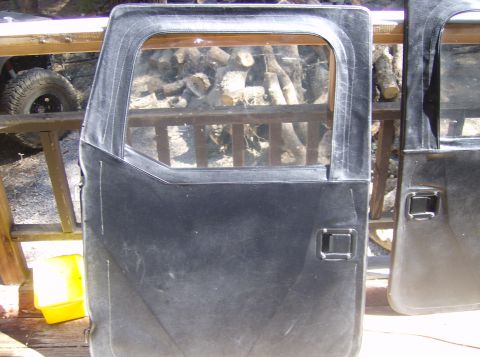 1986 Ford Bronco - Pair of soft doors with windows, likely for an older SUV or Jeep.