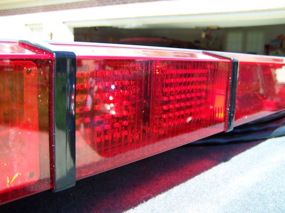 Red light bar with black trim