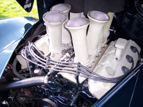 1972 Ford Ranchero - Close-up of a V8 engine six individual carburetors with mesh air filters.