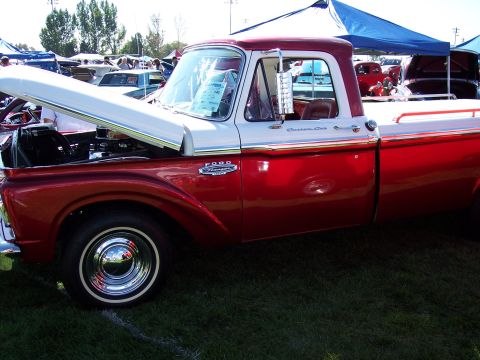 1972 Ford Ranchero - This 1965 Ford pickup truck is displayed at an outdoor car show.