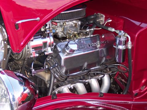 1972 Ford Ranchero - Close-up of a Ford Racing engine, showing chrome components and exhaust headers.