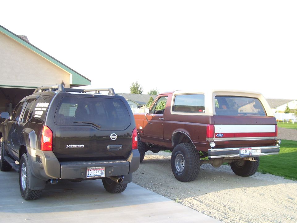 1990 Ford Bronco rear view, maroon with tan top