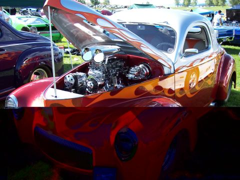 1972 Ford Ranchero - A custom hot rod with a powerful V8 engine and striking flame graphics is displayed at an outdoor car show.