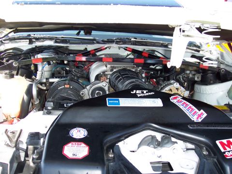 1972 Ford Ranchero - Customized engine bay with performance parts and decals visible.