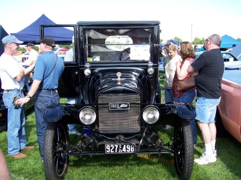 1972 Ford Ranchero - This 1923 Ford Model T is on display with spectators gathered around.