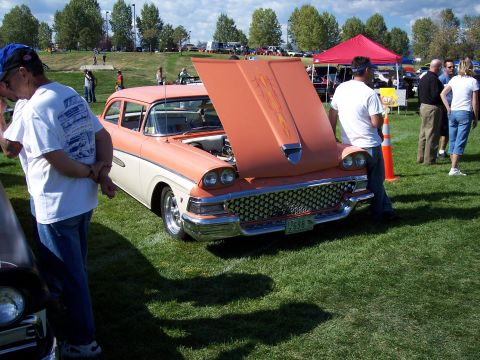 1972 Ford Ranchero - This 1957 Ford Fairlane 500 has a two-tone paint scheme and custom pinstripes on its open hood.