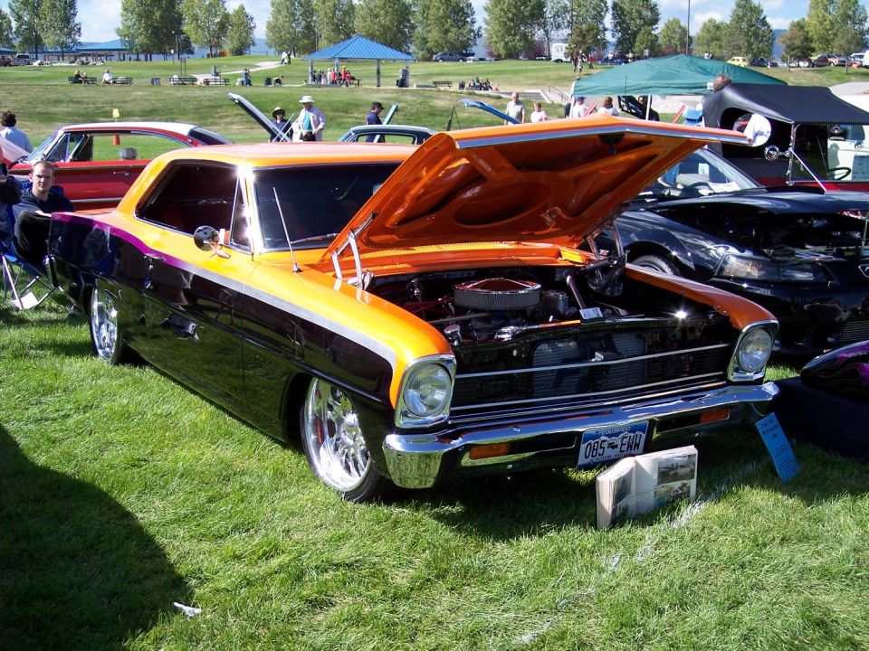 1967 custom coupe, orange and black two-tone, hood open, chrome wheels