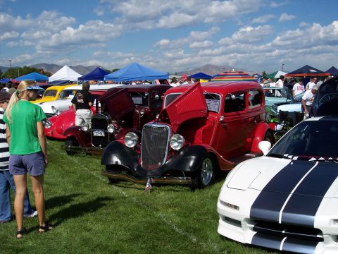 1972 Ford Ranchero - A variety of vintage automobiles are displayed on a sunny day at a car show.