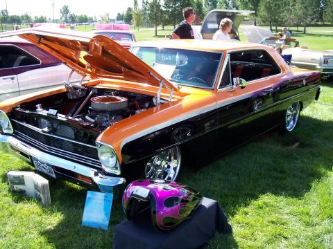 1972 Ford Ranchero - This customized 1967 Chevrolet Nova features a two-tone paint scheme and an exposed engine.