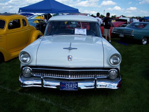 1972 Ford Ranchero - Front view of a white 1955 Ford Fairlane Crown Victoria at a car show.