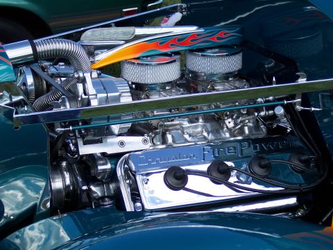 1972 Ford Ranchero - Close-up of a custom engine bay chrome components and flame graphics.