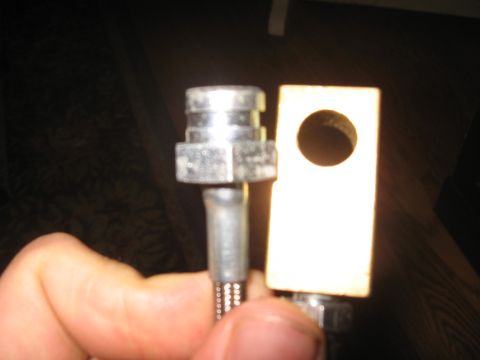1996 Ford Bronco - Metal brake line fitting and mounting bracket shown in detail.