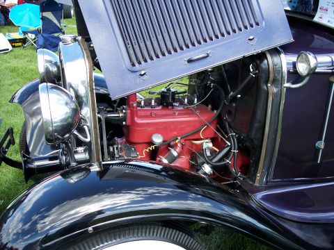 1972 Ford Ranchero - Close-up of a classic car's engine compartment, showing the motor and surrounding components.