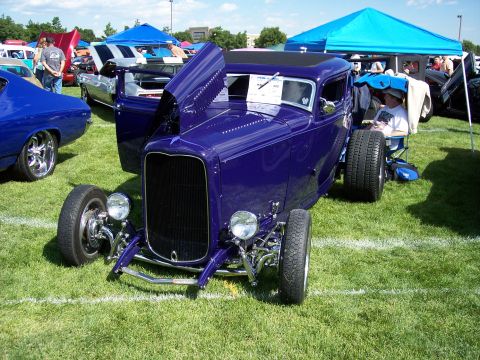1972 Ford Ranchero - Custom purple hot rod coupe displayed at an outdoor car show event.