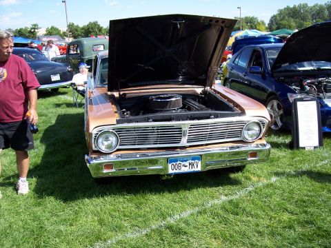 1972 Ford Ranchero - Front view of a 1964 Ford Falcon at an outdoor car show.
