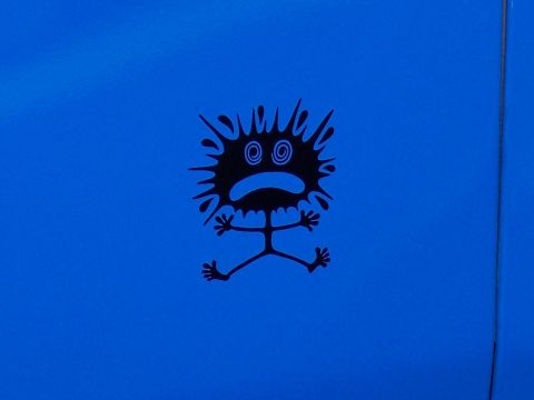 1972 Ford Ranchero - A sticker of a distressed cartoon character is displayed on a bright blue surface.