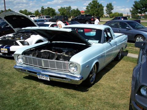 1972 Ford Ranchero - A light blue 1966 Ford Fairlane Ranchero is displayed with its hood open at an outdoor car show.