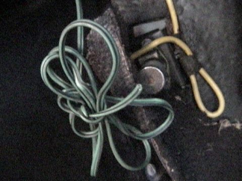 1977 Ford Mustang - Close-up of tangled electrical wires, likely part of a vehicle's wiring system.