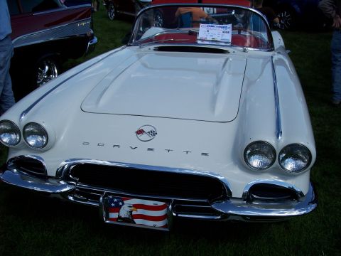 1972 Ford Ranchero - Front view of a white 1958 Chevrolet Corvette with an American flag license plate.