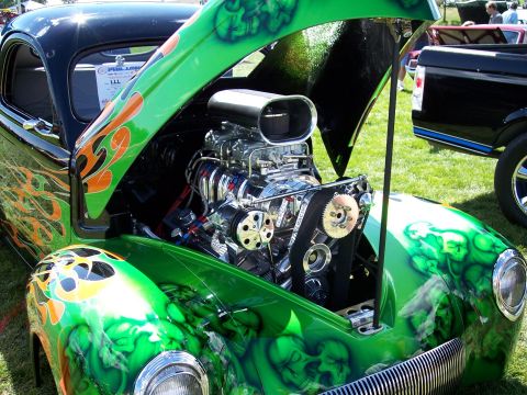 1972 Ford Ranchero - A custom hot rod with a blown engine is displayed outdoors, with a black pickup truck visible in the background.