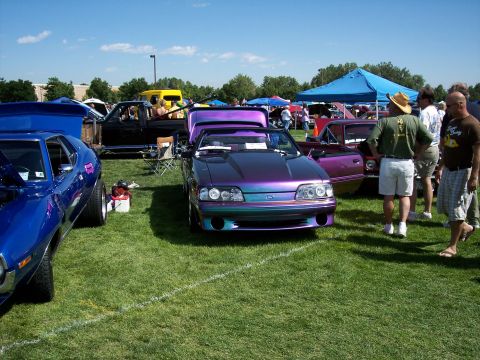 1972 Ford Ranchero - A custom painted 1990 Ford Mustang convertible is displayed at an outdoor car show.