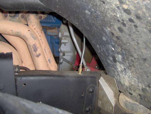 1978 Ford Bronco - Front line from m/c. The flex line is on the other side of this fitting and runs to the tee for the front brakes on top of the differential…
