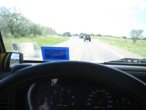 2001 Jeep Wrangler - Driving on a highway with other Jeeps in a convoy, seen from the interior of a Jeep Wrangler.