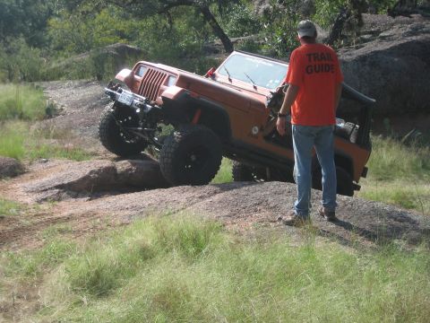 2001 Jeep Wrangler - A 2001 Jeep Wrangler navigates a rocky trail during an off-road event.