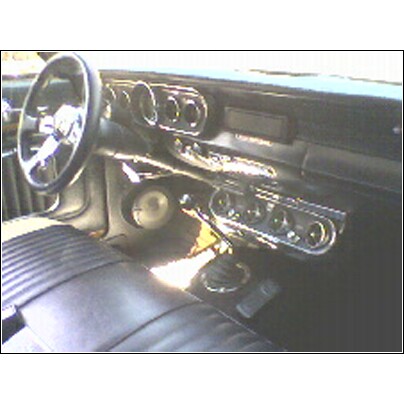 2007 Ford Ranchero - Interior view of a car's dashboard and seats, with visible text from a watermark.